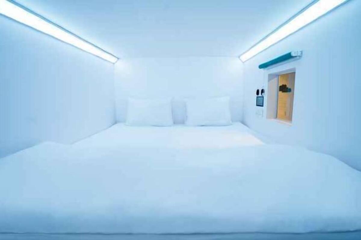 Quartos à prova de som, Wi-Fi de cortesia, roupa de cama