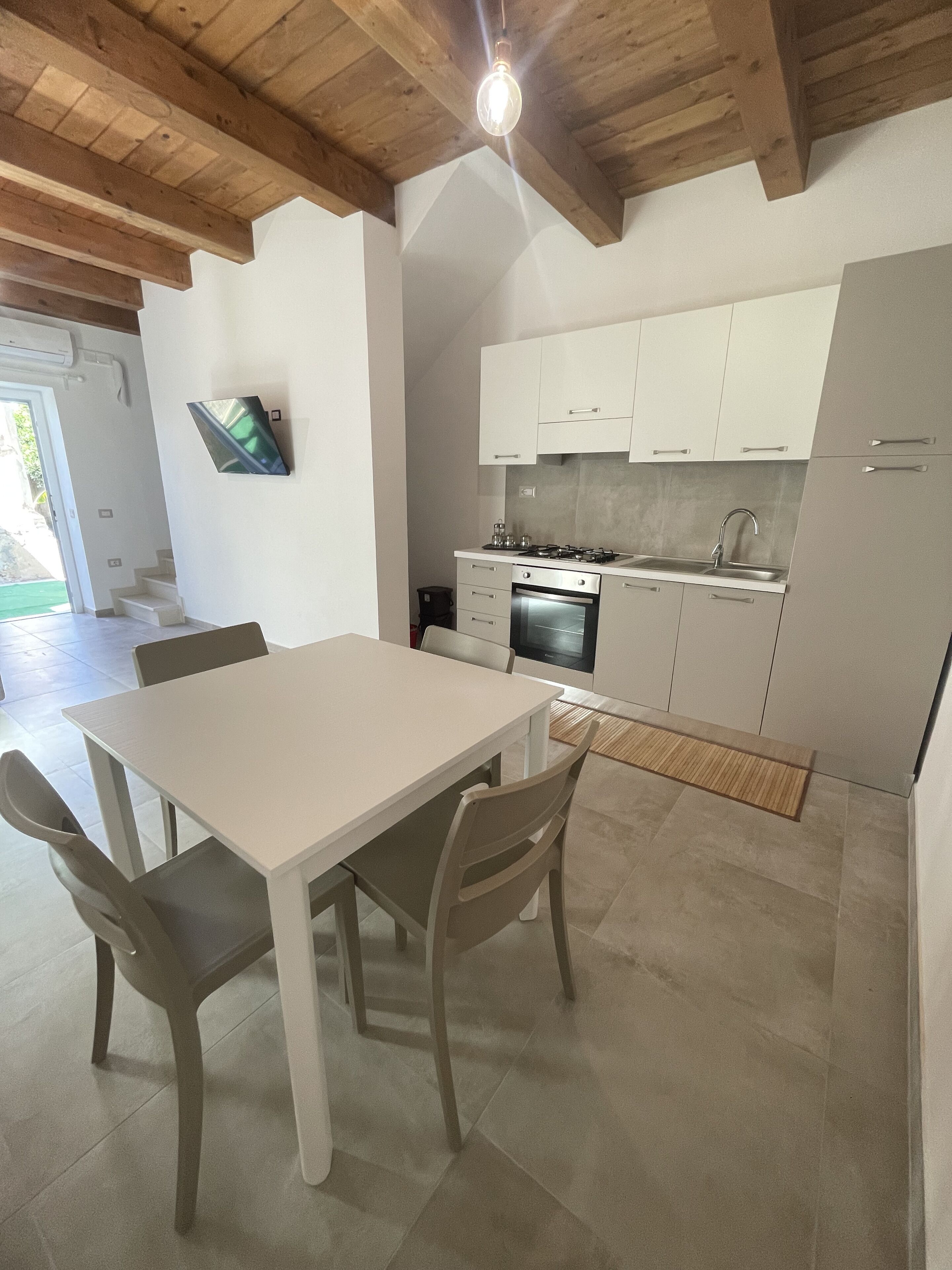 Departamento | Cocina privada | Refrigerador con congelador, horno y parrilla de estufa 