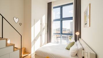 Studio Loft | Hypo-allergenic bedding, desk, laptop workspace, blackout drapes