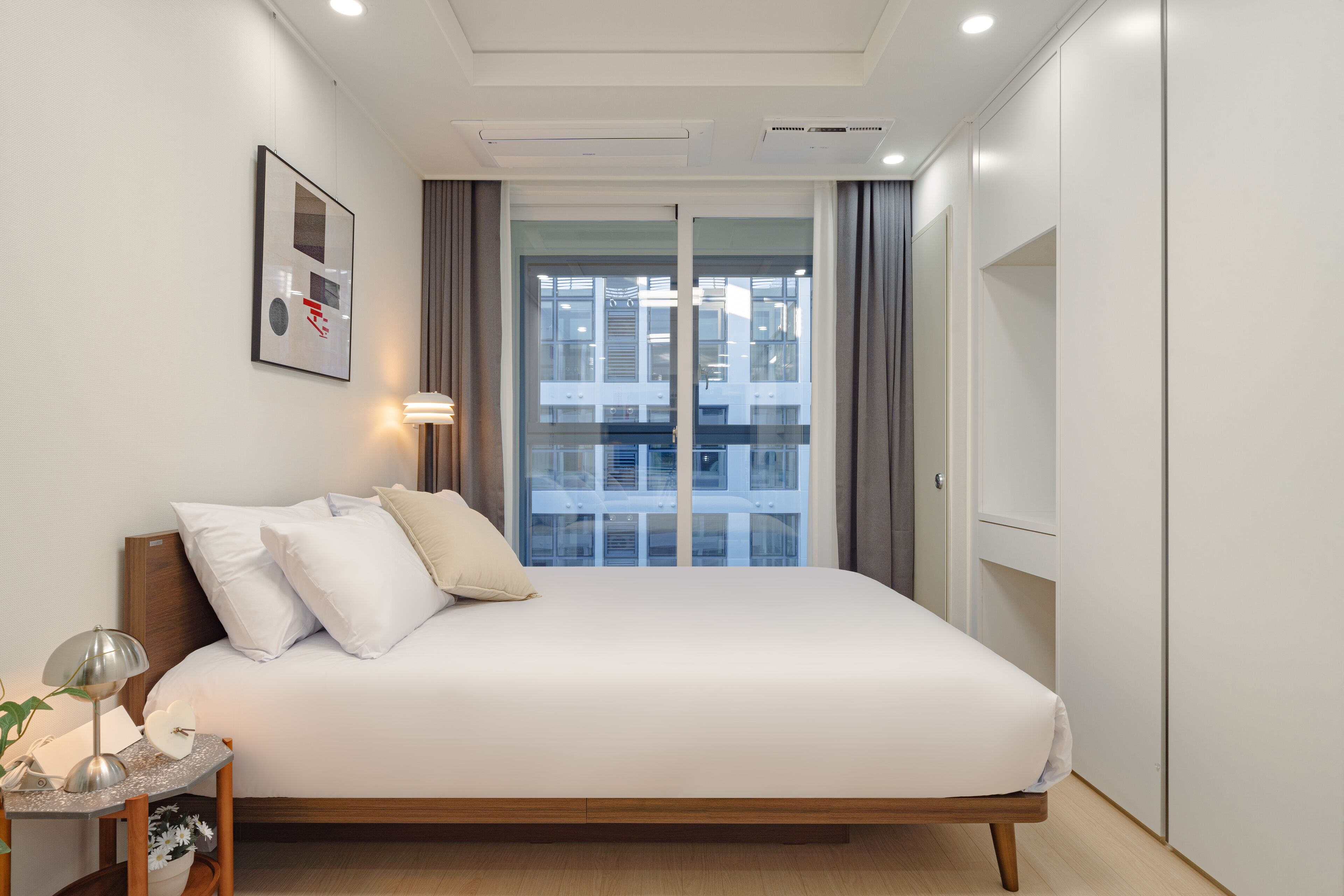 Studio | Hypo-allergenic bedding, desk, laptop workspace, blackout curtains