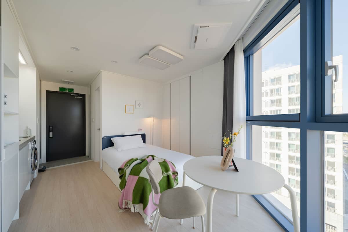 Studio Single | Hypo-allergenic bedding, desk, laptop workspace, blackout curtains