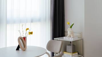 Studio Single | Living area | 43-inch Smart TV with cable channels