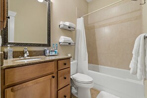 Hair dryer, towels, soap, shampoo