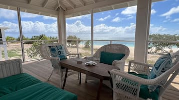Premium Cottage, 1 King Bed, Beach View | Terrace/patio