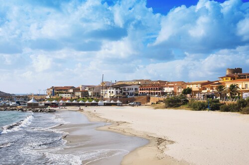 Holiday apartment with outdoor pool and a splendid terrace with sea view