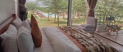 Quarto casal luxo | Vista para o lago