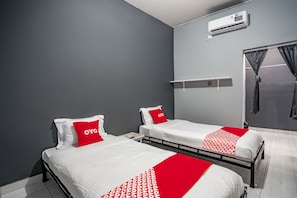 Chambre Deluxe avec lits jumeaux | Accès au Wi-Fi (inclus), literie fournie