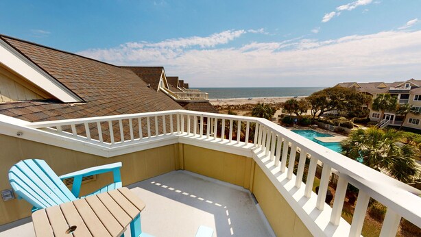 A balcony with a view of the beach and ocean. - Spectacular Penthouse Oasis with Mesmerizing Ocean Views (Isle of Palms)