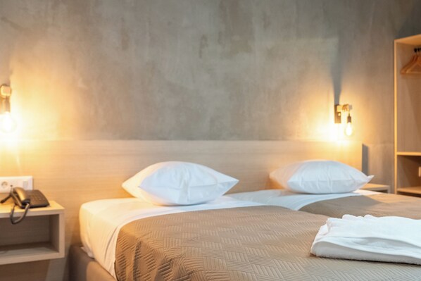 Camera Comfort con letto matrimoniale o 2 letti singoli | Una cassaforte in camera, postazione laptop, insonorizzazione