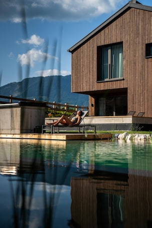 Indoor pool, seasonal outdoor pool, pool umbrellas, pool loungers