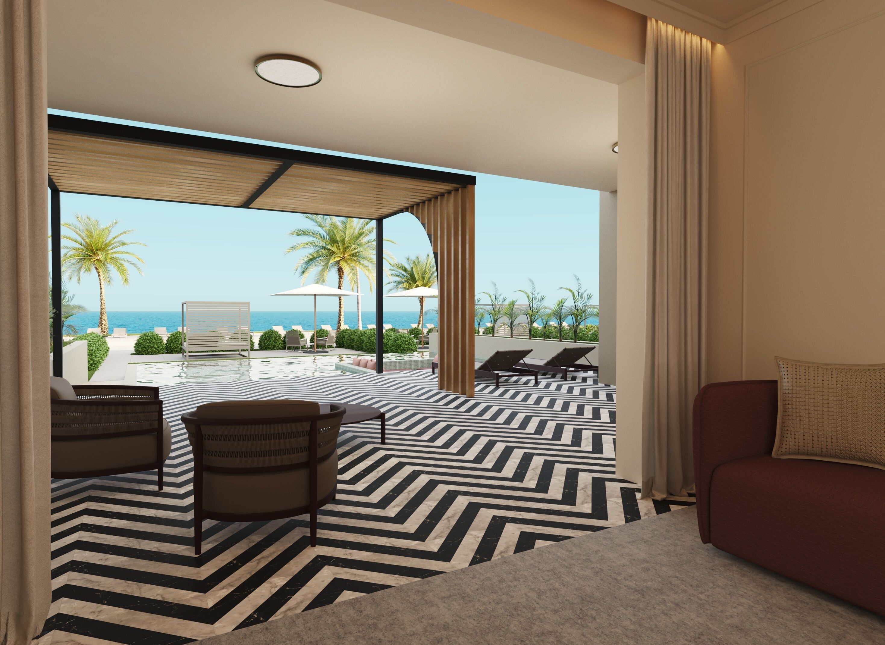 A modern hotel room with a large sliding glass door leading to a balcony with a pool, lounge chairs, and palm trees.
