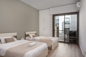精緻公寓, 2 間臥室, 城市景 | 2 間睡房、高級寢具、記憶棉床墊、房內夾萬