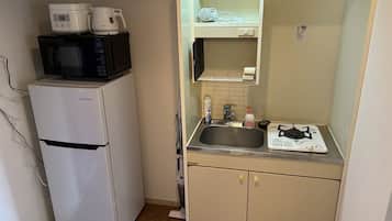 Basic Apartment | Private kitchen | Full-size fridge, microwave, stovetop, electric kettle