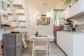 Fridge, oven, electric kettle, toaster