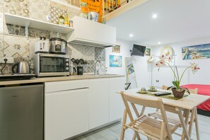 Fridge, oven, electric kettle, toaster