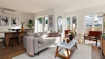 Apartment (3 Bedrooms) | Living area | 32-inch Smart TV with cable channels