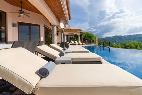 Experience a panoramic ocean view in this luxury 4 bedroom villa.