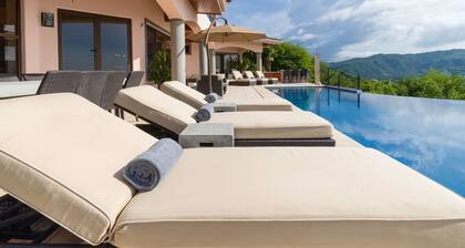 Experience a panoramic ocean view in this luxury 4 bedroom villa.