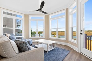 Living area - Oasis Vacations, Old Man By The Sea. Infinity Pool, Elevator, Marsh Views! (Ocean Isle Beach)