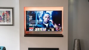 A television mounted on a wall with a Netflix interface displaying the show 'Top Boy.' - 2 Bed - City Centre on your doorstep Parking! (Cheshire West and Chester)