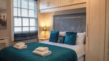 2 bedrooms, iron/ironing board, travel cot, WiFi