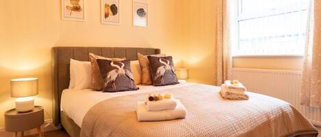 3 habitaciones, tabla de planchar con plancha y cuna de viaje