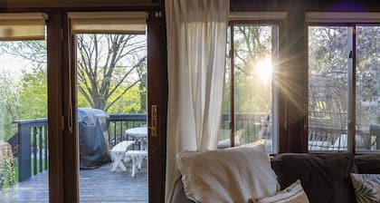 Charming Cottage with Hot Tub, Fire Pit, & Wooded Backyard