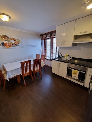 Apartment | Private kitchen | Full-size fridge, microwave, oven, stovetop