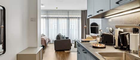 Comfort suite with sofa bed & balcony | 1 bedroom, individually decorated, individually furnished, desk