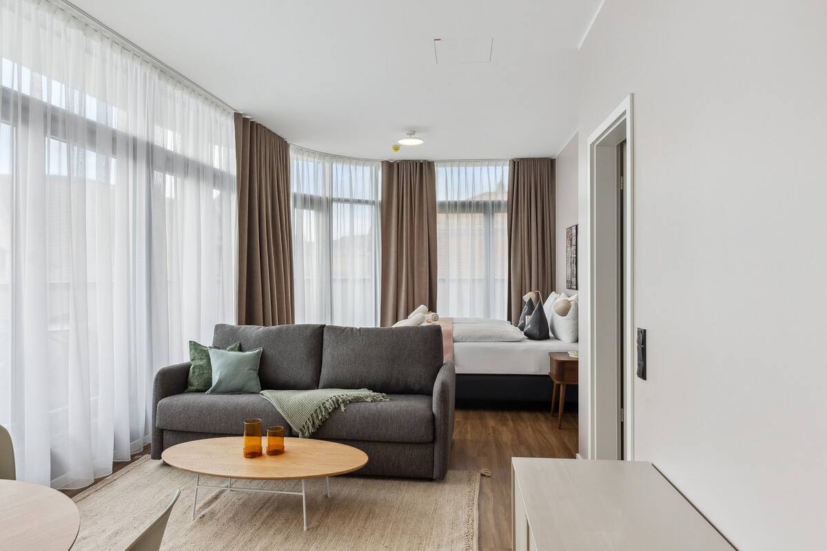 Economy suite with sofa bed & balcony | Desk, laptop workspace, blackout curtains, free WiFi