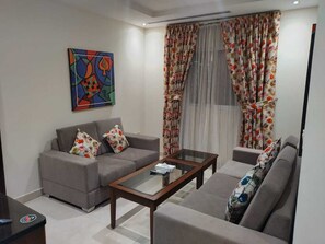 Deluxe-Doppelzimmer | Wohnbereich