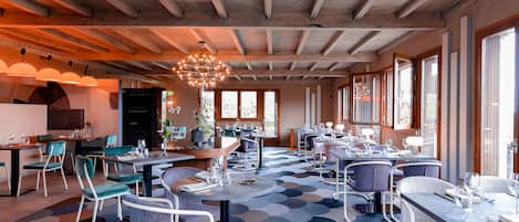 Lunch, dinner served; French cuisine, garden views