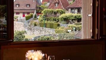 Lunch, dinner served; French cuisine, garden views