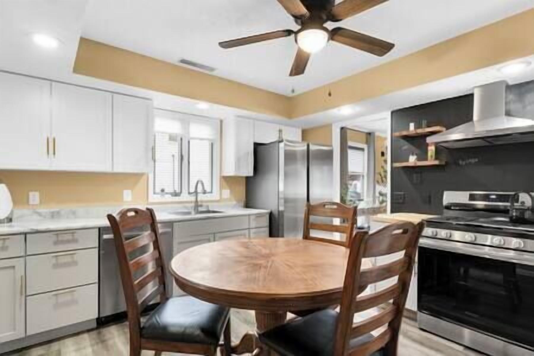 Fridge, coffee/tea maker, highchair, cookware/dishes/utensils