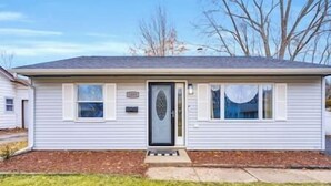 A single-story house with a front door, two windows, and a small porch. - Ranch near gordyville, sports complex, 13 miles from hospitals (Rantoul)