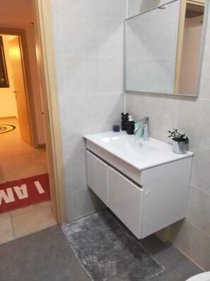 Hair dryer, towels, soap, toilet paper