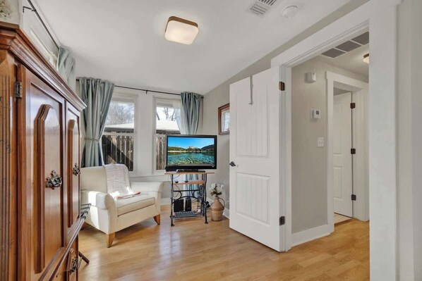 Smart TV, fireplace, books