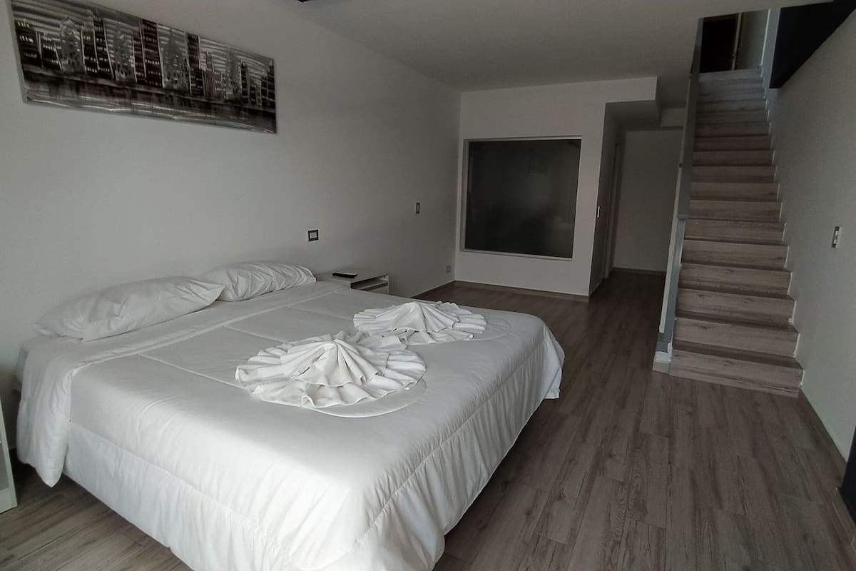 Family Apartment, Kitchenette | 2 bedrooms, in-room safe, blackout curtains, iron/ironing board