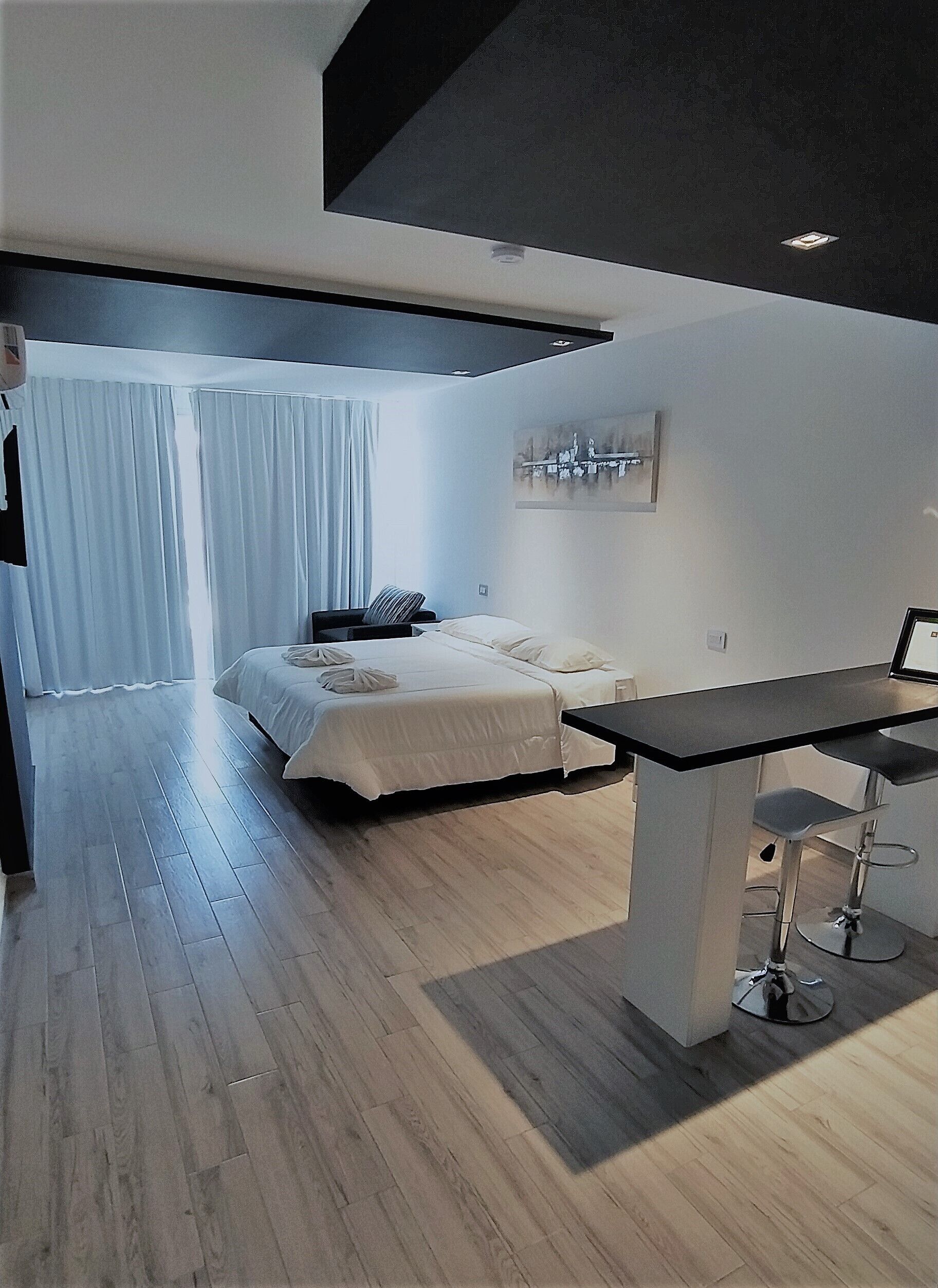 Standaard kamer, 1 queensize bed | Een kluis op de kamer, verduisterende gordijnen
