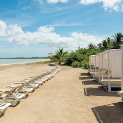 On the beach, sun-loungers, beach umbrellas, beach towels