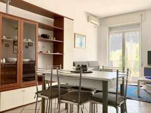 Panoramic Apartment | Living area | 22-inch Smart TV with cable channels - Apartment Tirreno (Tirrenia)