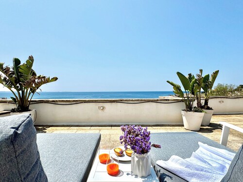 Beachfront villa with panoramic terrace