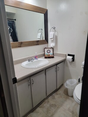Shower, eco-friendly toiletries, towels, soap