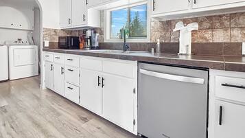 Coffee/tea maker, fridge, microwave, oven