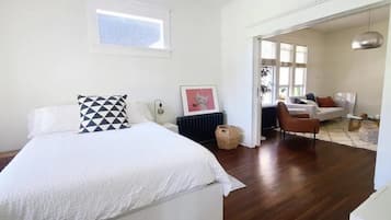 1 bedroom, desk, iron/ironing board, travel crib