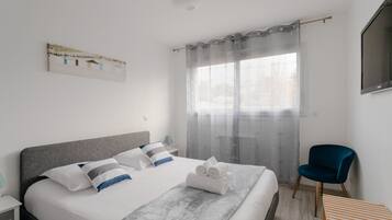 4 slaapkamers, een strijkplank/strijkijzer, gratis wifi, beddengoed