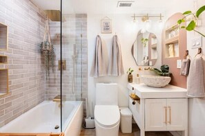 Shower, hair dryer, towels, soap
