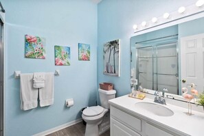 Shower, hair dryer, towels