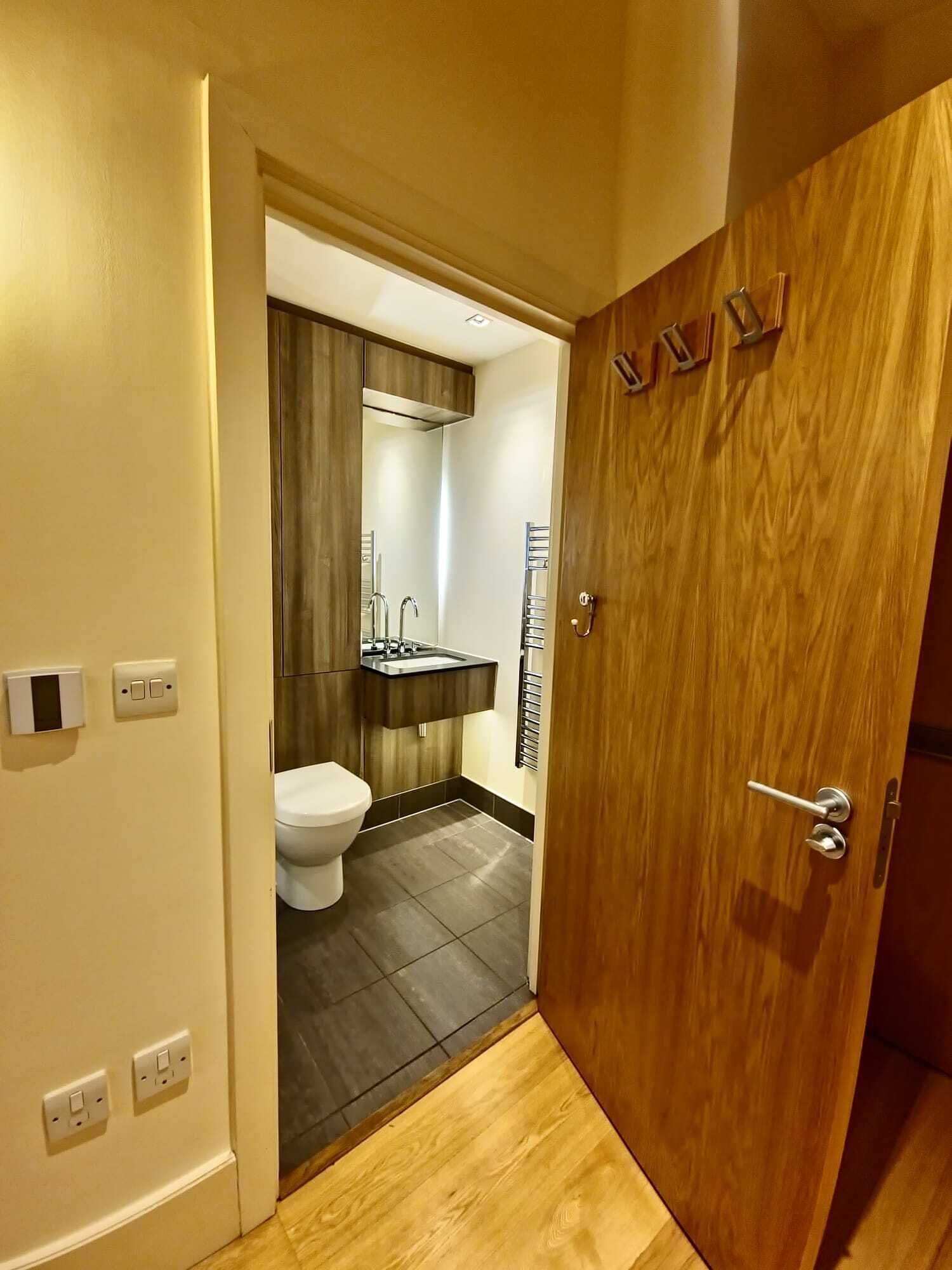 Shower, hair dryer, towels, shampoo