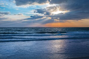 On the beach, sun-loungers, beach towels